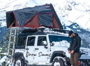 Drew Simms parked his jeep for outdoor camping in heavy snowfall, Oregon