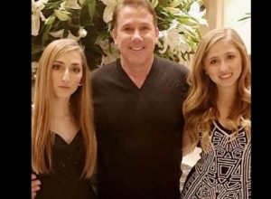 Photo of Savannah Marin Sparks with her dad Nicholas Spark and her sister during Valentine day