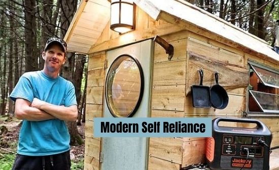Modern Self Reliance Kevin Leclair relaxing after building mini cubic wood stove.