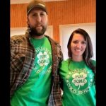 Derek Bieri with his wife Jessica wearing green shirt promoting Irish cold snack available on their store