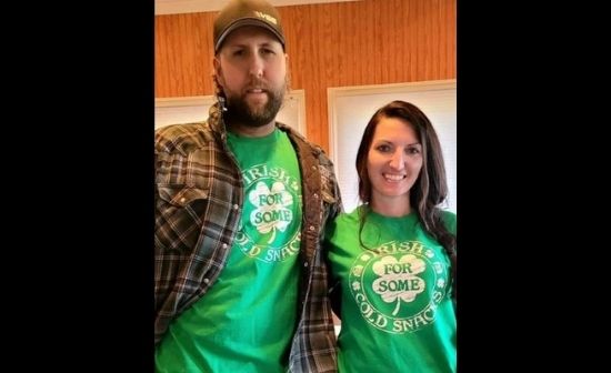 Derek Bieri with his wife Jessica wearing green shirt promoting Irish cold snack available on their store